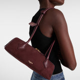 ALAIA LE TECKEL SMALL BI-MATERIAL BAG IN LEATHER